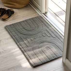 Olav - Drmtte i slvfarvet uld, rektangulr 50 x 80 cm.