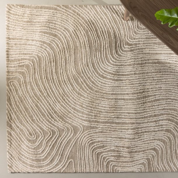 Troost - Tppe i beige polyester, 200 x 290 cm.