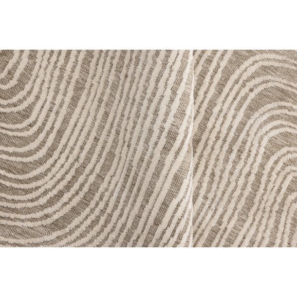 Troost - Tppe i beige polyester, diameter p 200 cm.