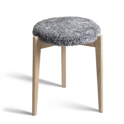 Assist - Taburet med lysegr� f�reskindss�de, syv forskellige finish