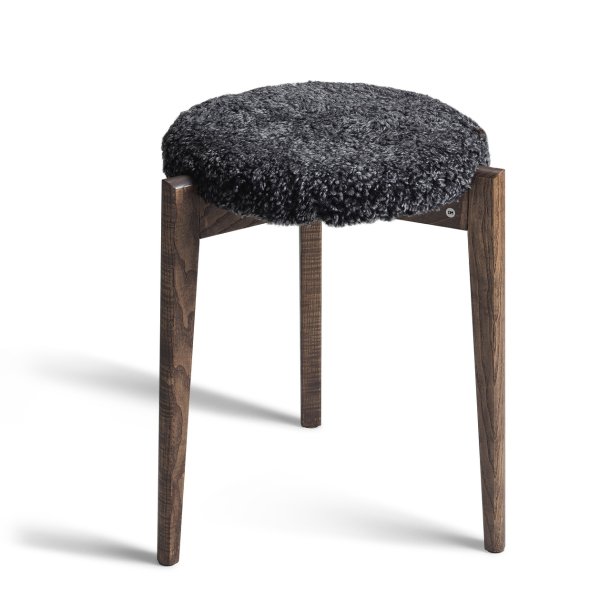 Assist - Taburet med m�rkegr� f�reskindss�de, syv forskellige finish