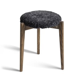Assist - Taburet med m�rkegr� f�reskindss�de, syv forskellige finish