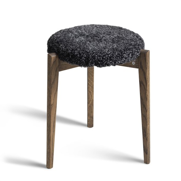 Assist - Taburet med m�rkegr� f�reskindss�de, syv forskellige finish
