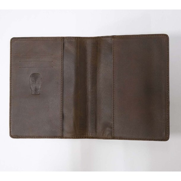 Omslag i mrkebrun lder