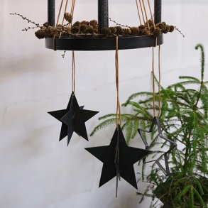 Stjrna i patinerad svart metall