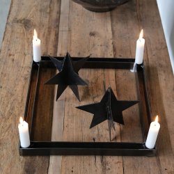 Stj�rna i patinerad svart metall